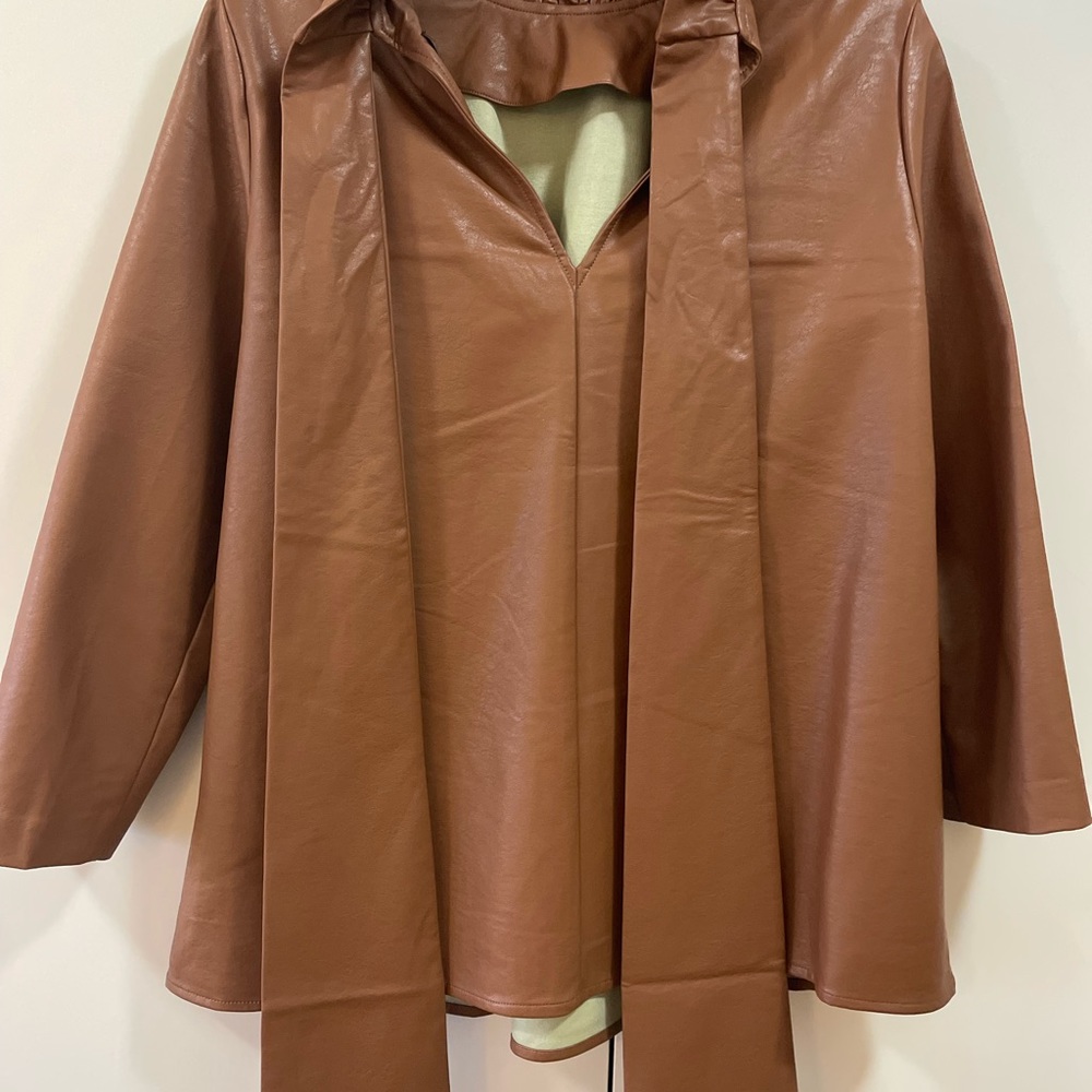 Tucker Nuck Faux Leather top with back bow.